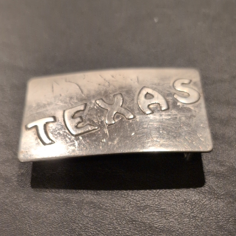 Texas Belt Buckle. Texas In Raised Letters. Priced Low Due To Scratches